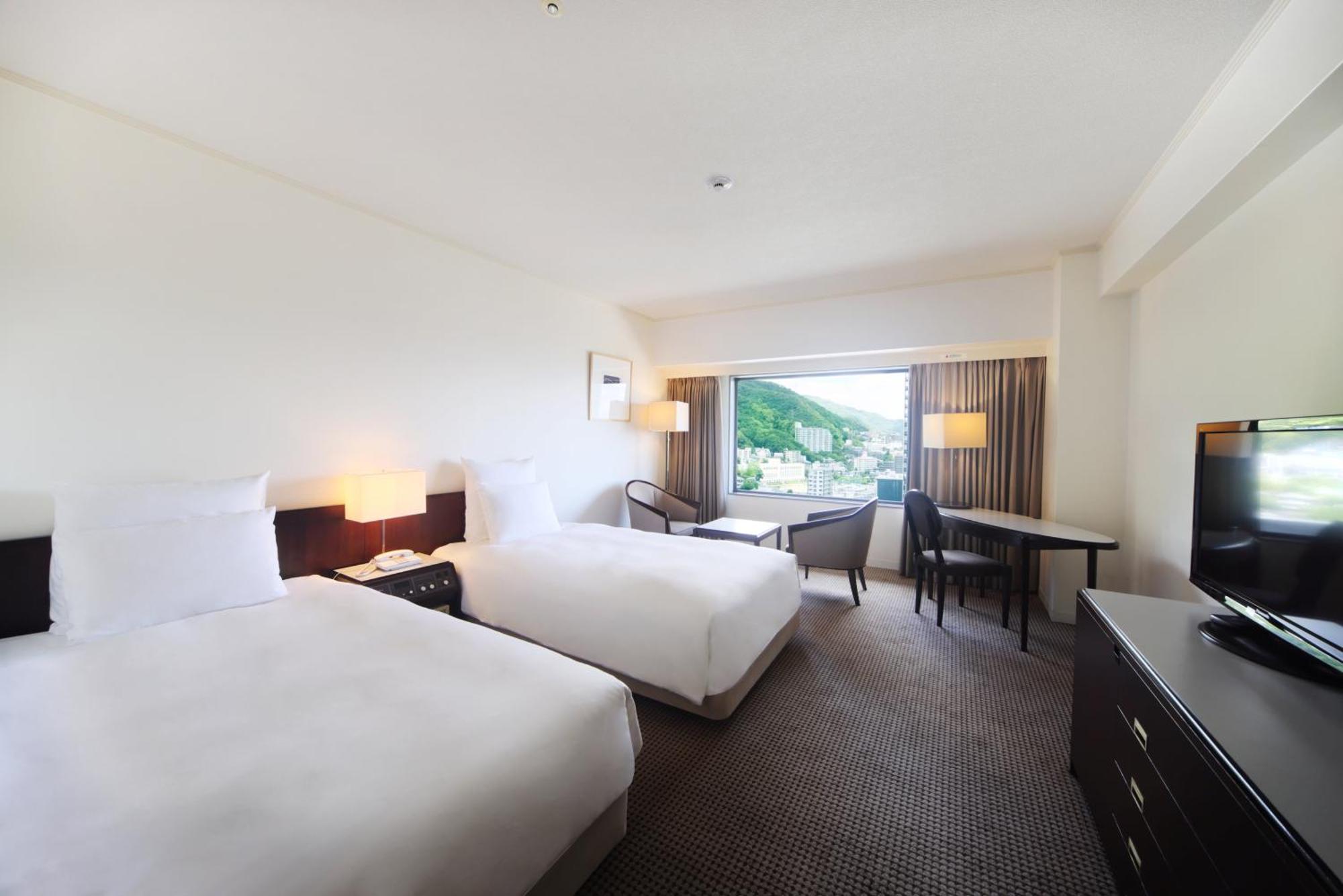 Ana Crowne Plaza Kobe By Ihg Hotel Exterior foto A room at the hotel